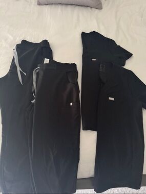 2 sets of Figs Black Scrubs